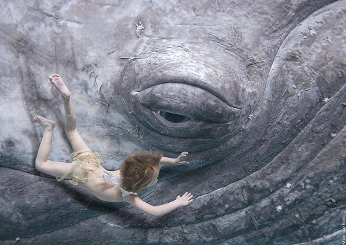 Young boy and whale calf: The Waterbabies by Charles Kingsely |